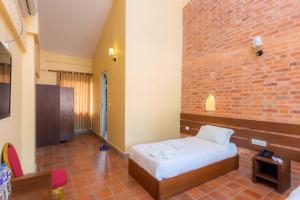 Badreni Jungle Resort, Sauraha客房内的一张或多张床位