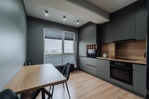 Η κουζίνα ή μικρή κουζίνα στο Rîșcani Comfort Near McD & Kaufland +32 φωτογραφίες