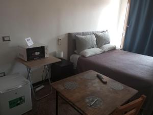 Postel nebo postele na pokoji v ubytování Executive center rooms