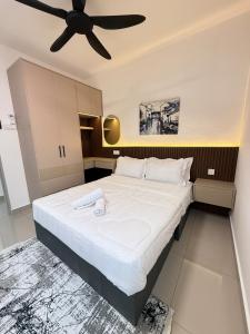 Ένα ή περισσότερα κρεβάτια σε δωμάτιο στο The Cozy Nest Luxury apartment JB 10 pax +26 φωτογραφίες