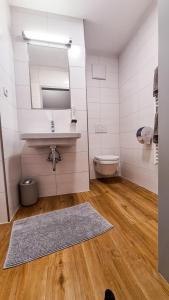 Koupelna v ubytování Gasthof Weissl + 37 fotografií