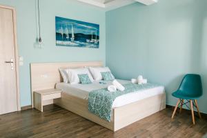 Posteľ alebo postele v izbe v ubytovaní Anastasia Rooms