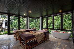 Posezení v ubytování Unagi Mas Villa by Emana