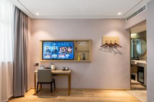 Weiting Hotel Shanghai Xujiahui Stadium Subway Station Branch電視和／或娛樂中心