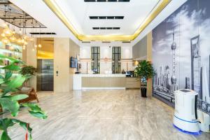 Weiting Hotel Shanghai Xujiahui Stadium Subway Station Branch大廳或接待區