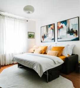 Postel nebo postele na pokoji v ubytování Apartments Villa Marid