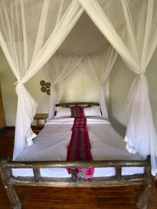 Ένα ή περισσότερα κρεβάτια σε δωμάτιο στο Savannah Murchison Lodge