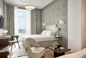 ON Residence - Small Luxury Hotels of the World客房内的一张或多张床位
