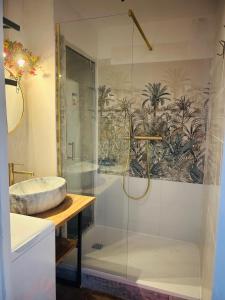 Et badeværelse på Vue Mer et à 20m de la plage Parking SEALECQUES