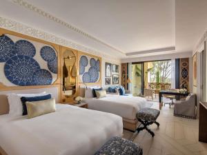 Postel nebo postele na pokoji v ubytování Fairmont Tazi Palace Tangier