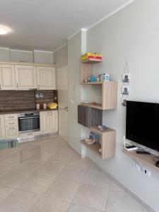 Køkken eller tekøkken på Shengjin Apartments + 2 billeder