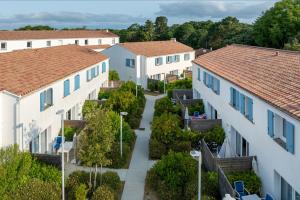 an aerial view of a row of houses at Résidence Prestige Odalys Le Domaine des Pins in Noirmoutier-en-l'lle
