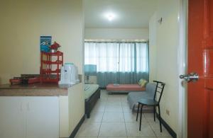 Η κουζίνα ή μικρή κουζίνα στο Winland JY7 Cebu by RedDoorz
