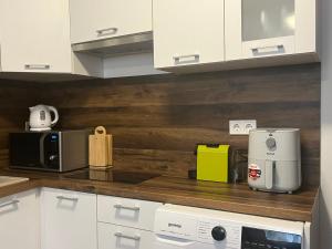 Η κουζίνα ή μικρή κουζίνα στο ElDorado apartman