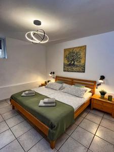 Katil atau katil-katil dalam bilik di Apartmani Vanja