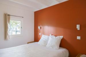 Slow Village Biscarrosse Lac客房内的一张或多张床位