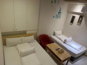 Postel nebo postele na pokoji v ubytování Tilon Hotel