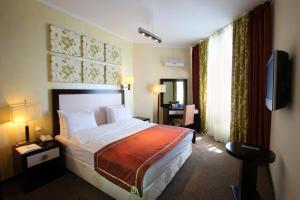 Ένα ή περισσότερα κρεβάτια σε δωμάτιο στο Kazakhstan Express