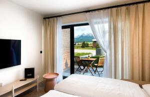 Postel nebo postele na pokoji v ubytování Natur Resort + 37 fotografií
