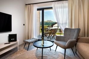 A television and/or entertainment centre at Natur Resort