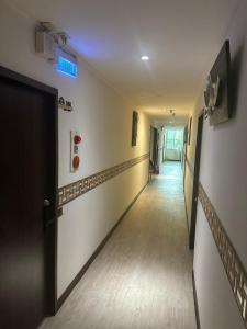 TV a/nebo společenská místnost v ubytování Tilon Hotel