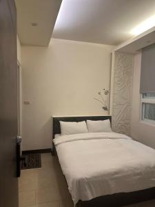 Postel nebo postele na pokoji v ubytování Tilon Hotel