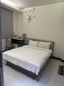Postel nebo postele na pokoji v ubytování Tilon Hotel