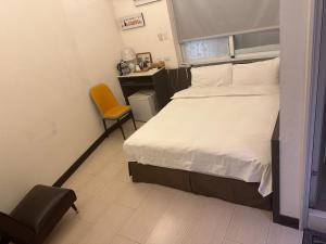 Postel nebo postele na pokoji v ubytování Tilon Hotel
