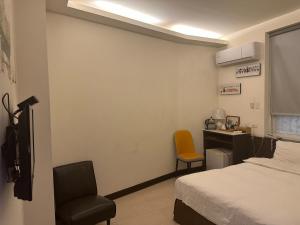 Postel nebo postele na pokoji v ubytování Tilon Hotel