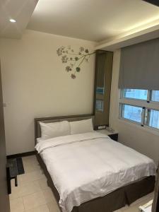 Postel nebo postele na pokoji v ubytování Tilon Hotel