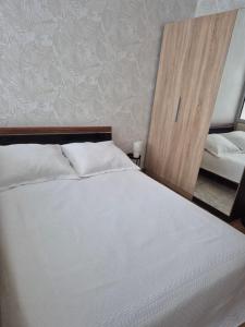 Postel nebo postele na pokoji v ubytování Apartament z tarasem Zeta Park