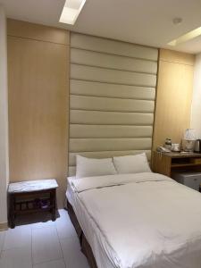Postel nebo postele na pokoji v ubytování Tilon Hotel