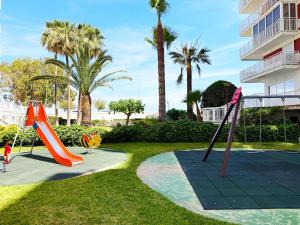 a park with a playground with an slide at BeniforniaLove in Benicàssim