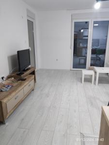 TV a/nebo společenská místnost v ubytování Mara + 4 fotografie