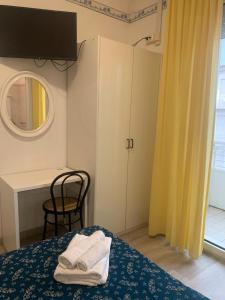 Postel nebo postele na pokoji v ubytování Hotel Sissi