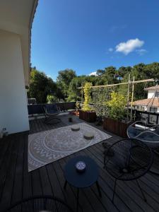 Balkon lub taras w obiekcie La Villa Des Trois Pins