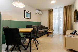 TV a/nebo společenská místnost v ubytování Sagitta All inclusive light
