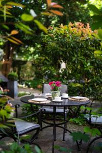 Um jardim em Hotel Villa Florentina