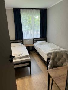 Hotel Kliper客房内的一张或多张床位