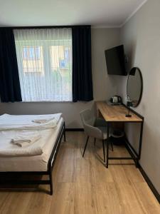 Hotel Kliper客房内的一张或多张床位