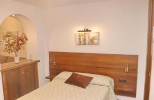 A bed or beds in a room at Estudio en el centro de Conil