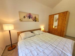 Katil atau katil-katil dalam bilik di Haus am Walde +41 gambar