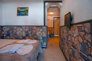 TV a/nebo společenská místnost v ubytování İMREN'S OTEL