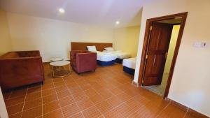 Postel nebo postele na pokoji v ubytování Orpurwa Resort
