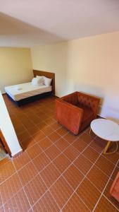 Postel nebo postele na pokoji v ubytování Orpurwa Resort + 4 fotografie