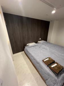 Katil atau katil-katil dalam bilik di モナークホテル +3 gambar