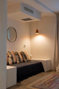 Кровать или кровати в номере VILLA FLAKA Boutique Hôtel Confidentiel et Convivial