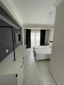 Ένα ή περισσότερα κρεβάτια σε δωμάτιο στο Cle Beach Boutique Hotel +67 φωτογραφίες