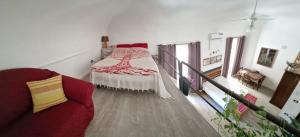 A bed or beds in a room at Maqueda Apartments