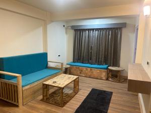 Posezení v ubytování Norbu Thungkar Homestay